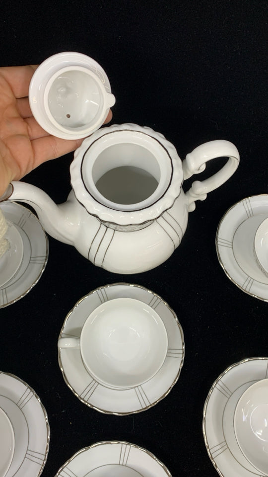 13PC FINE CHINA TEASET WHITE W/SILVER RIM.