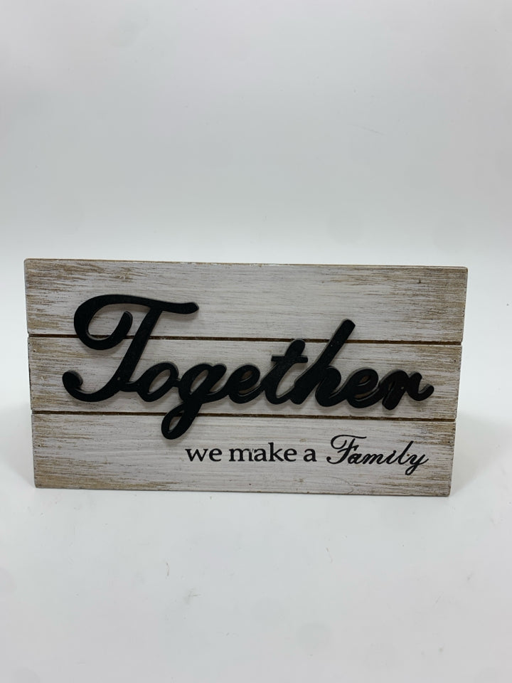TOGETHER WE MAKE A FAMILY TRIANGULAR BLOCK SIGN.
