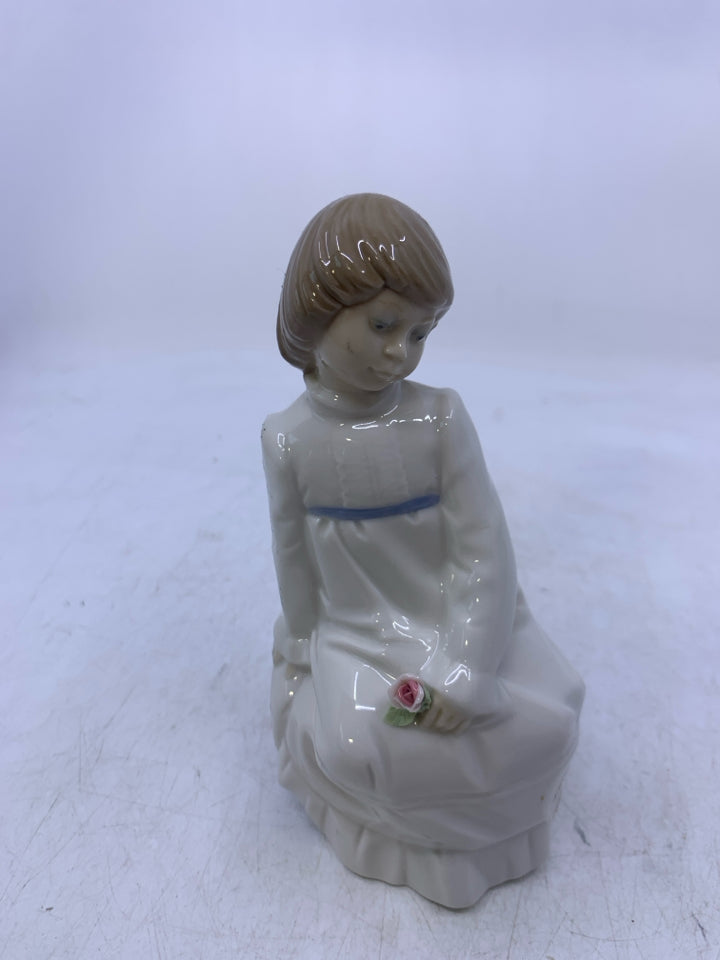 SITTING GIRL W/ ROSE IN HAND.