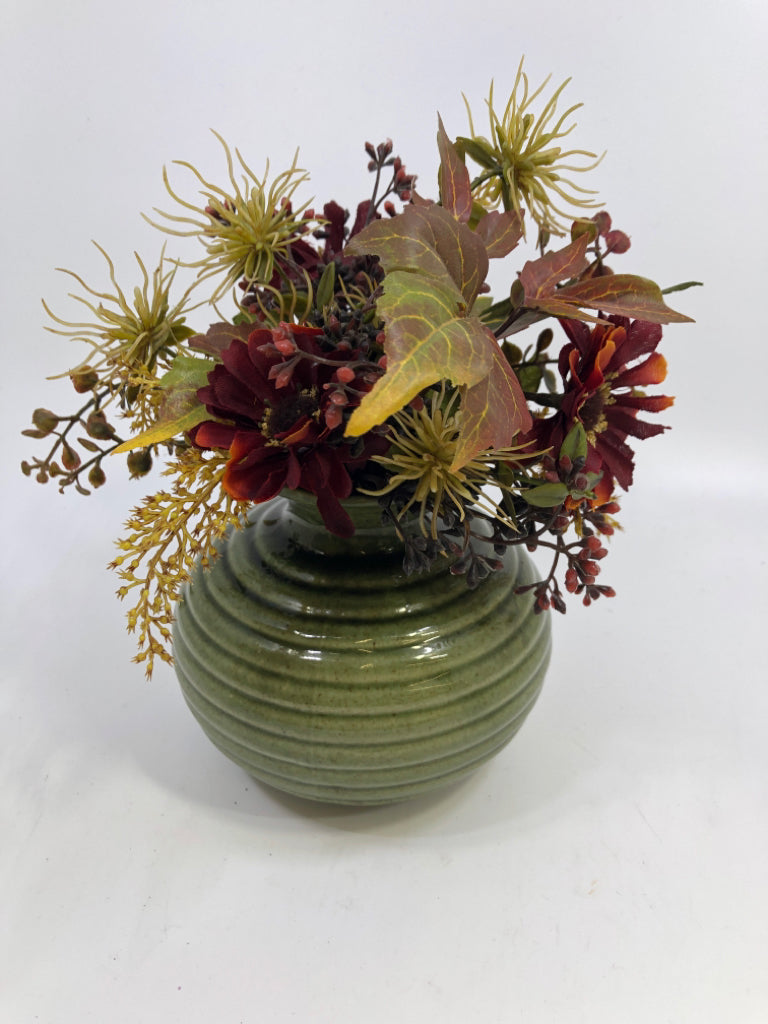 GREEN CERAMIC RIBBED VASE W/FAUX FLORALS.