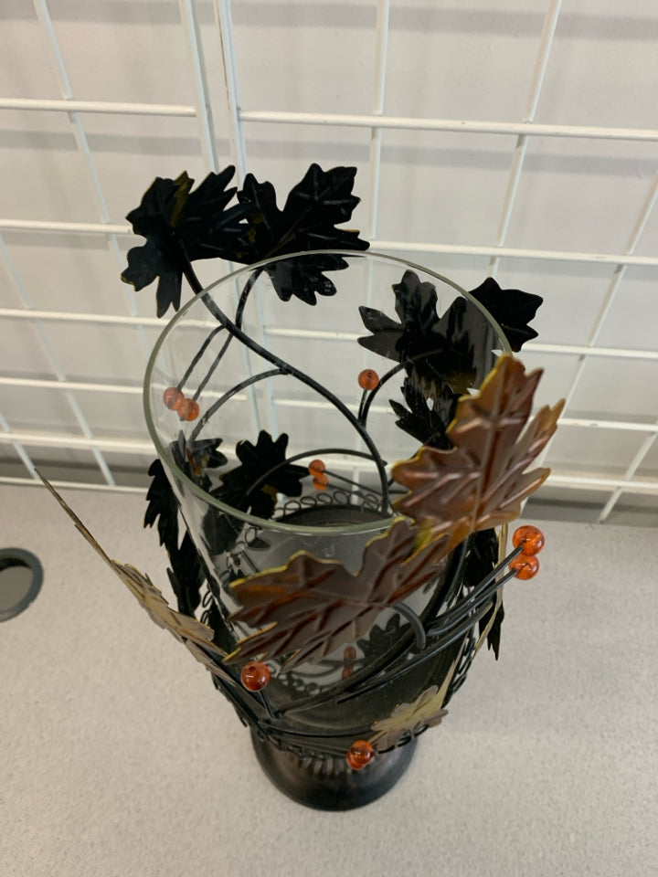 METAL LEAF PEDESTAL CANDLE HOLDER.