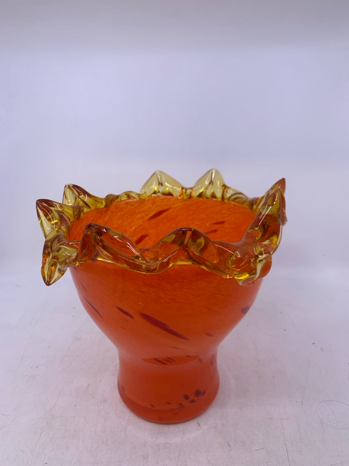 HEAVY BRIGHT ORANGE VASE W/ YELLOW POINTY UNEVEN RIM.