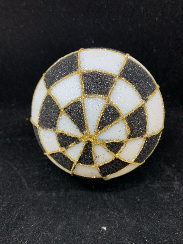 SPARKLY CHECKERED BALL ORNAMENT W/ DOT BULB ON TOP.