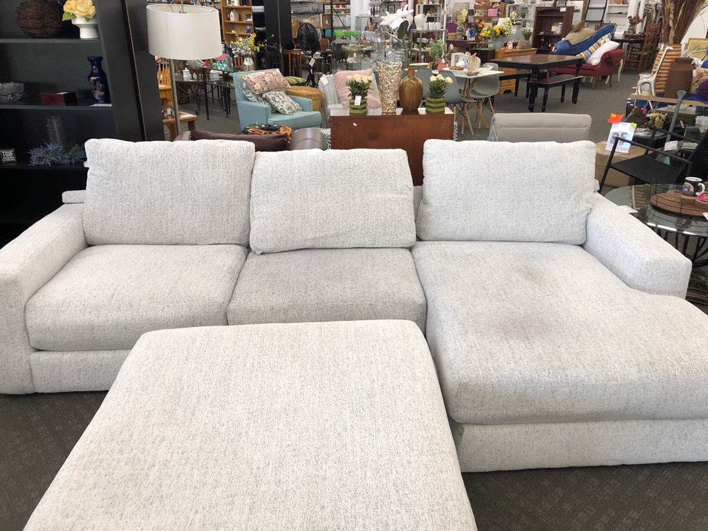 WHITE FABRIC SECTIONAL SOFA W/OTTOMAN.