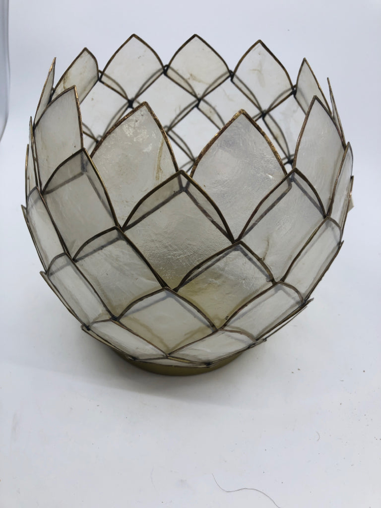 DELICATE FLORAL EGG SHAPED CANDLE HOLDER.