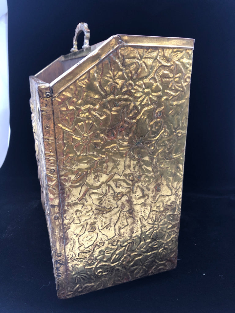 VTG BRASS MAGAZINE HOLDER W/EMBOSSED DESIGN FAMILY BAKING IN COTTAGE.