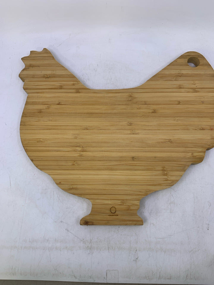BLONDE HEN SHAPED CUTTING BOARD.