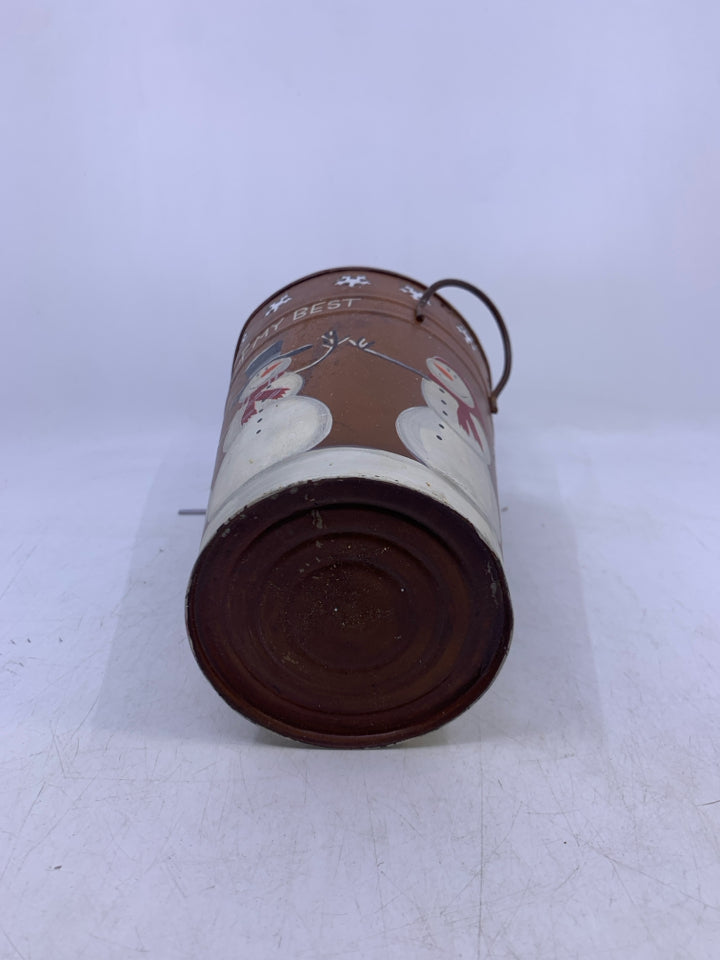 METAL BUCKET VASE W/ PRIMITIVE STYLE SNOWMAN W/ PIERCED SNOWFLAKES.