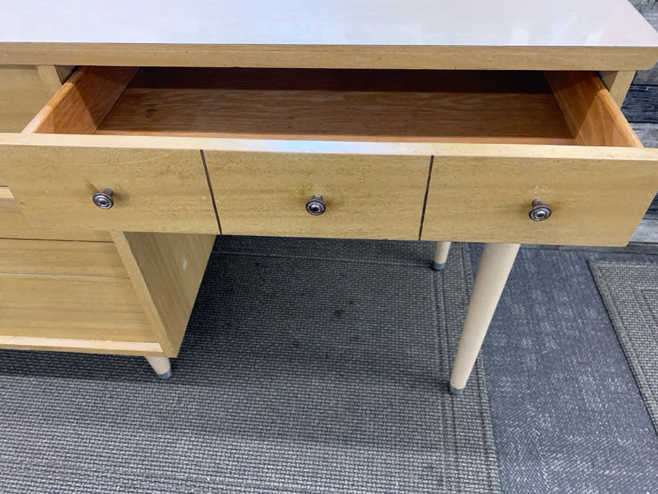 VTG BLONDE DESK W 3 DRAWERS.