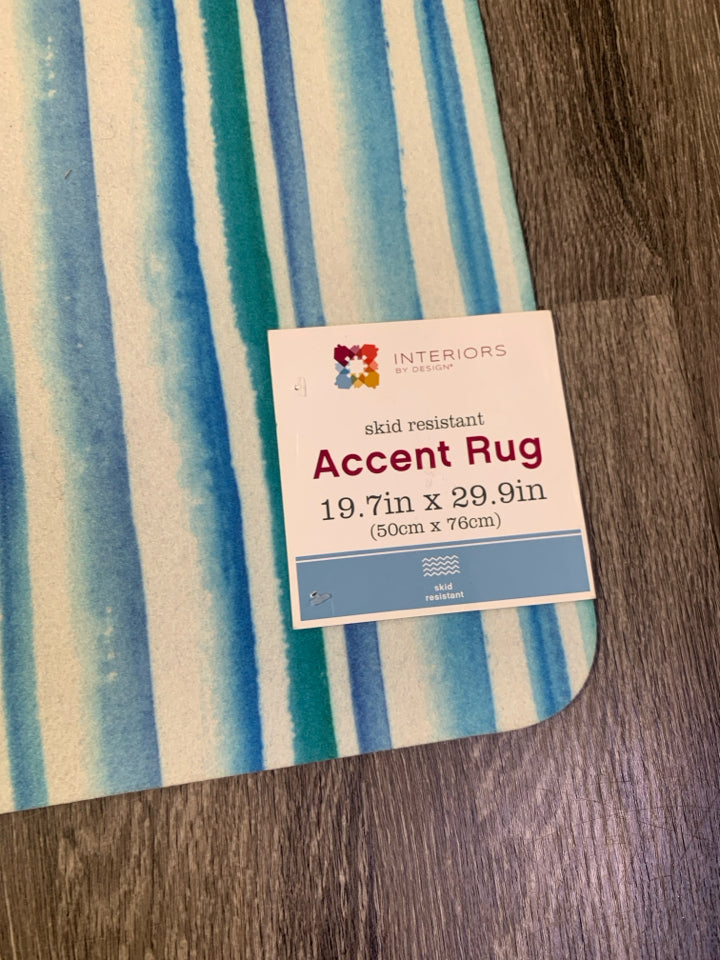 BLUE/GREEN STRIPPED SKID RESISTANT ACCENT RUG.