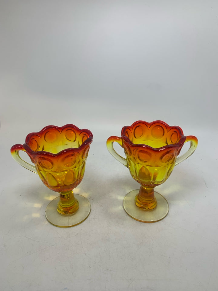 VTG 2 PC FOOTED AMBERINA SUGAR/CREAMER W/ SCALLOP EDGE.