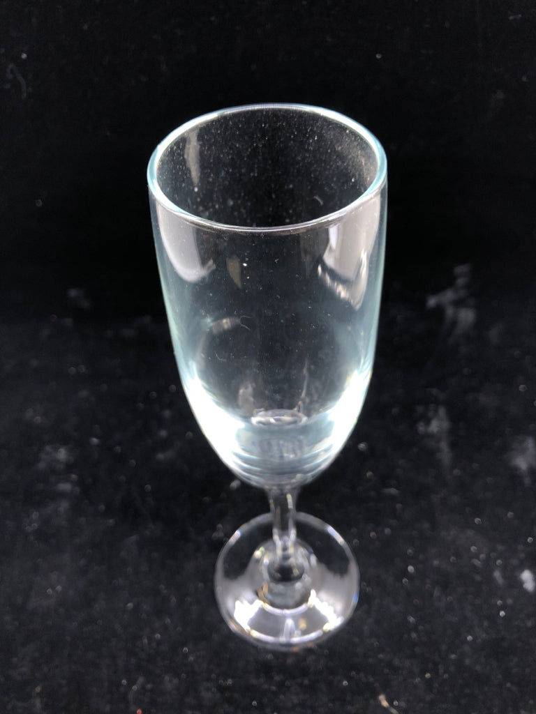 4 CLEAR CHAMPAGNE GLASSES.