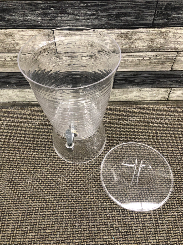 RAISED PLASTIC DRINK DISPENSER.