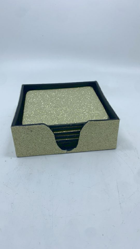 6PC GOLD GLITTER COASTERS W/HOLDING CASE.
