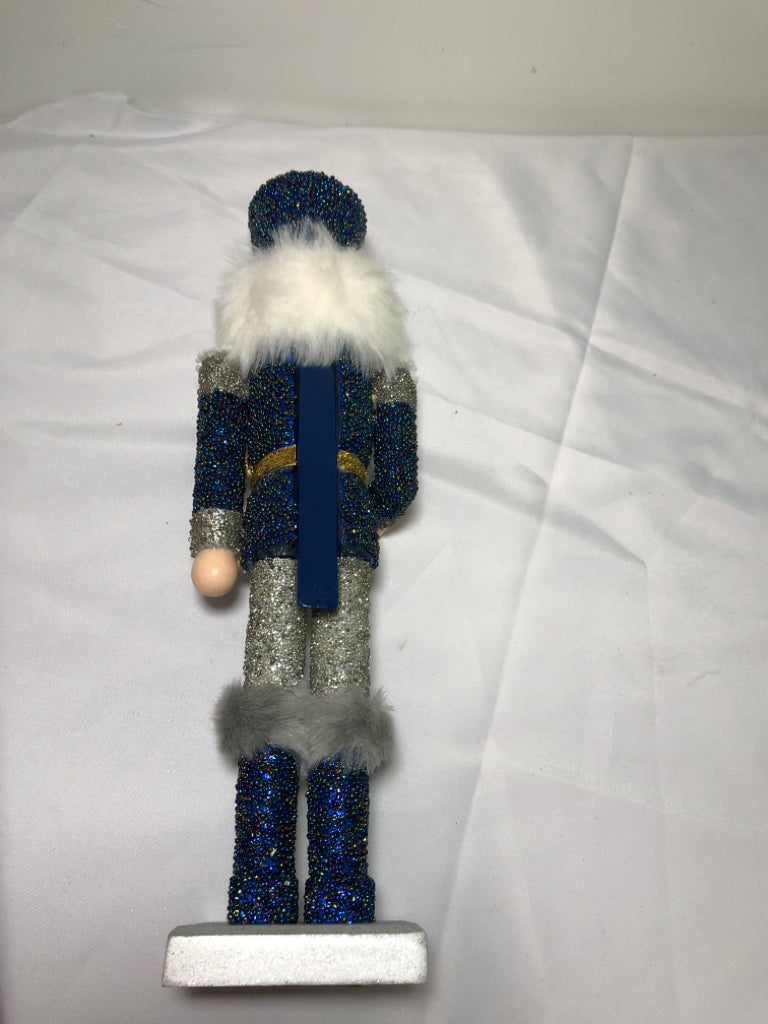 BLUE AND SILVER SNOWFLAKE NUT CRACKER.