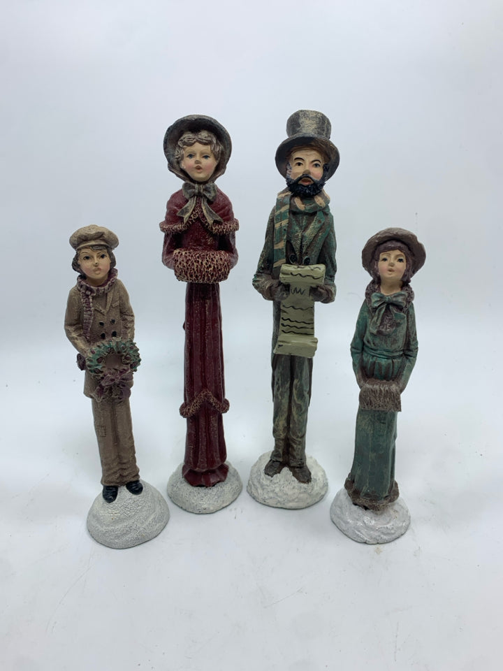 4 SKINNY RESIN CAROLERS IN BAG.