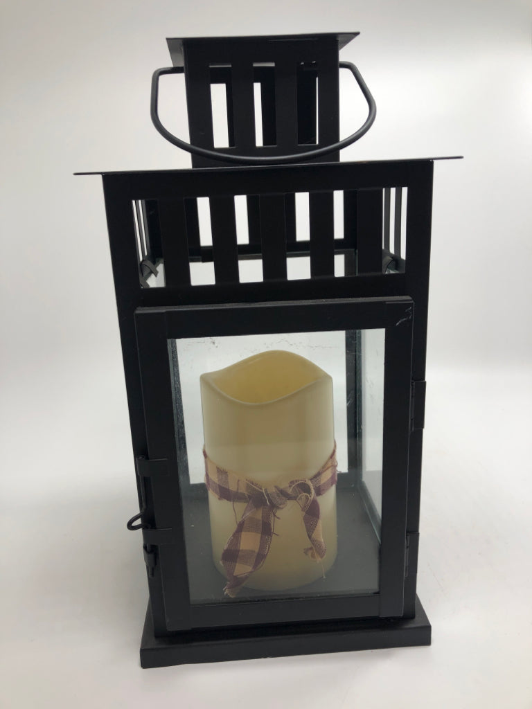 FAUX CANDLE IN BLACK LANTERN.