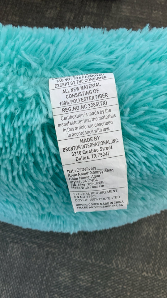 TEAL FURRY ACCENT PILLOW.