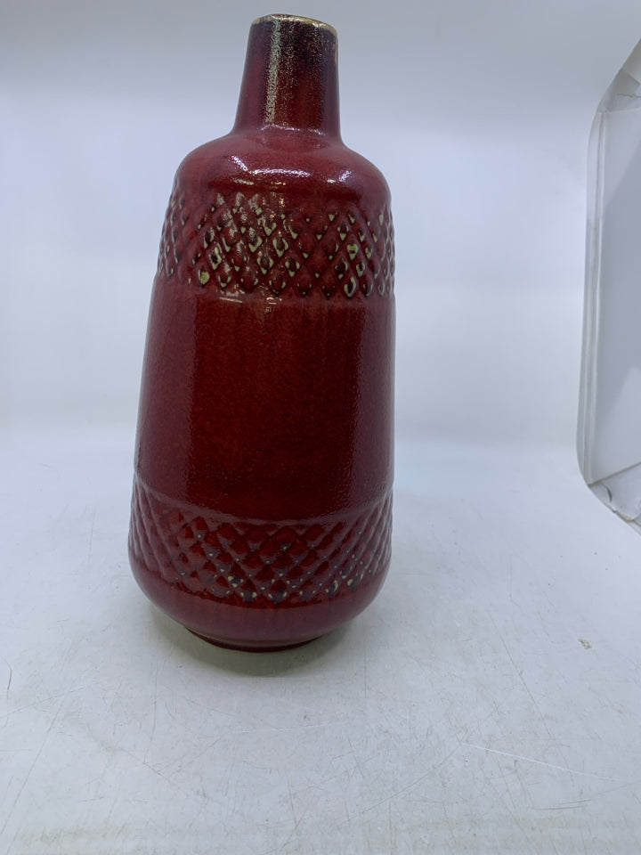 HEAVY DARK RED VASE W/ EMBOSSED DIAMOND PATTERN.