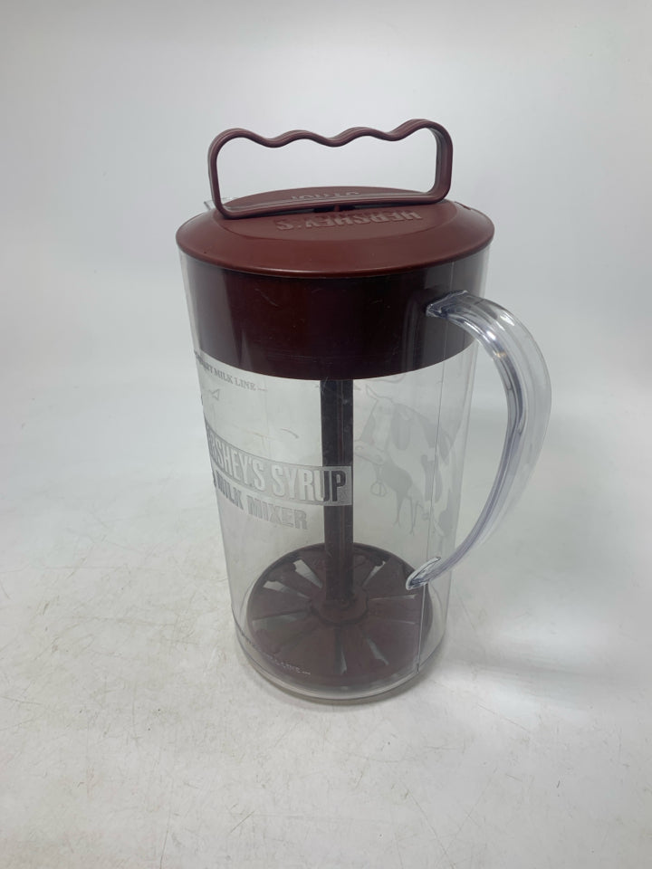 PLASTIC RETIRED MILK MIXER PITCHER.