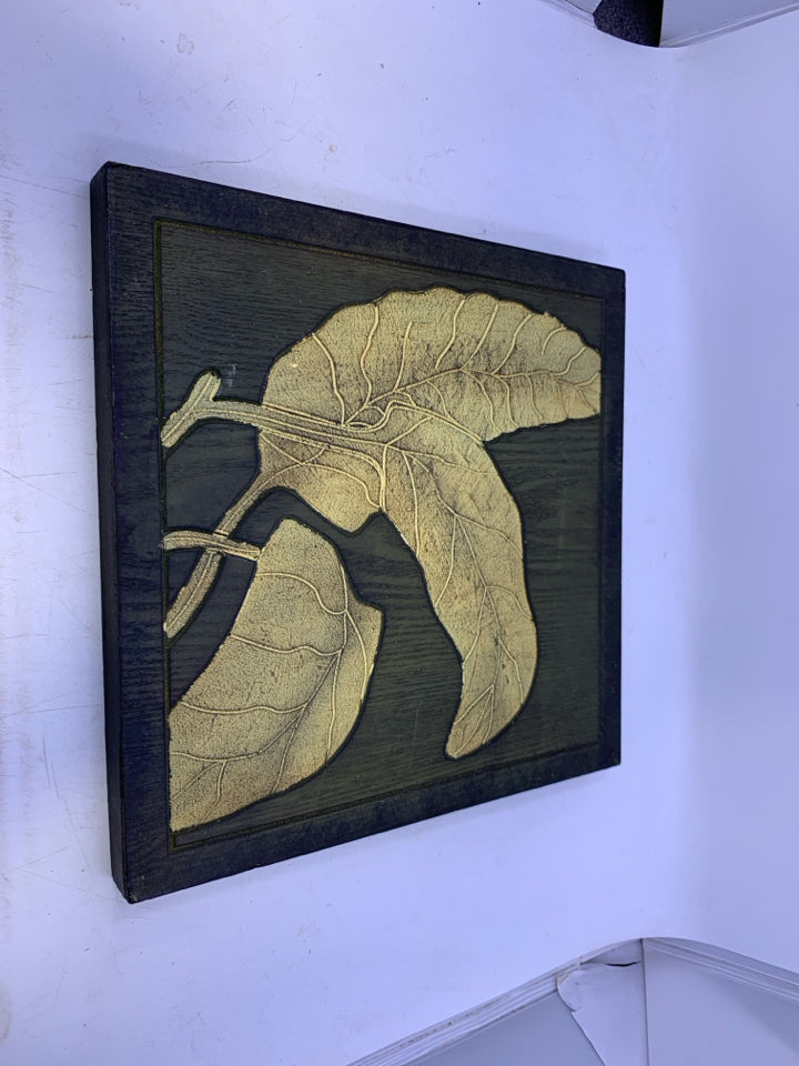 CARVED LEAVES WALL PLAQUE.