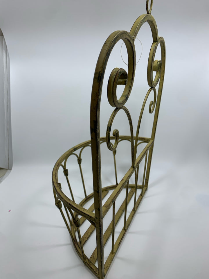 DISTRESSED YELLOW METAL SCROLL WALL POCKET.