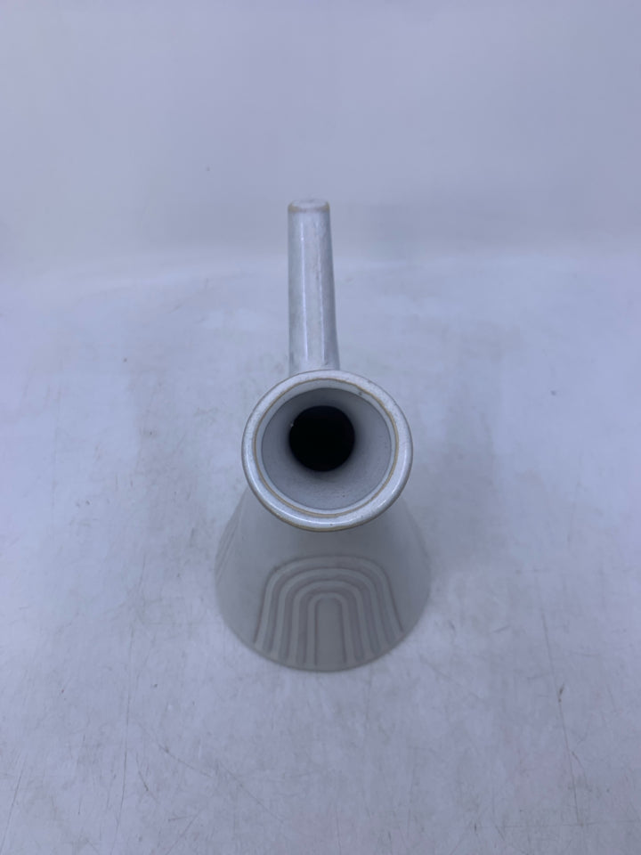 WHITE VASE W/ CARVED ARCHES HANDLE W/ SLATED NECK.