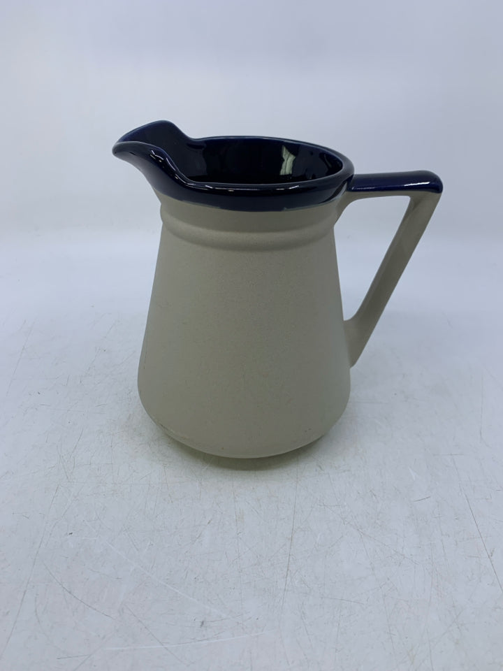 MATTE GRAY PITCHER W/ GLAZED COBALT BLUE INSIDE.