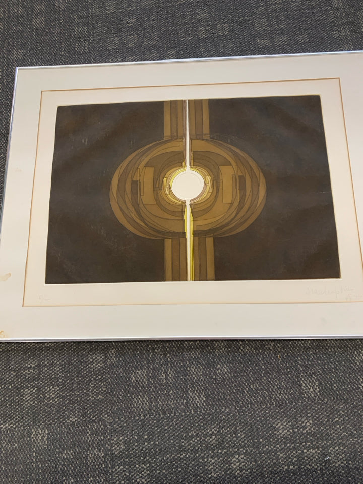 ABSTRACT CIRCLE WALL ART- SIGNED IN SILVER FRAME.