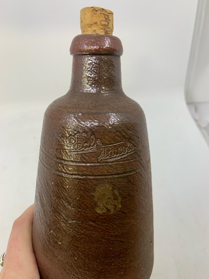 VTG EMPTY DARK BROWN POTTERY BOTTLE.