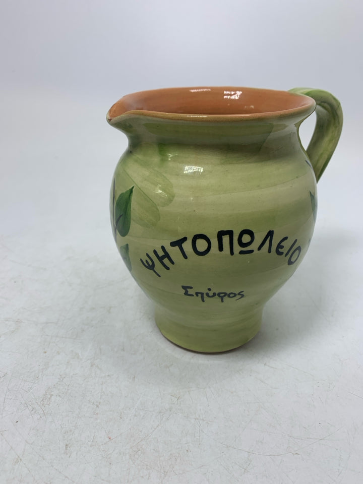 LIGHT GREEN TERRA COTTA SCRIPT PITCHER.