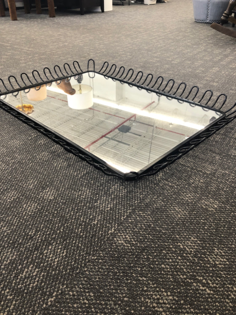 BLACK METAL FRAMED WALL MIRROR.