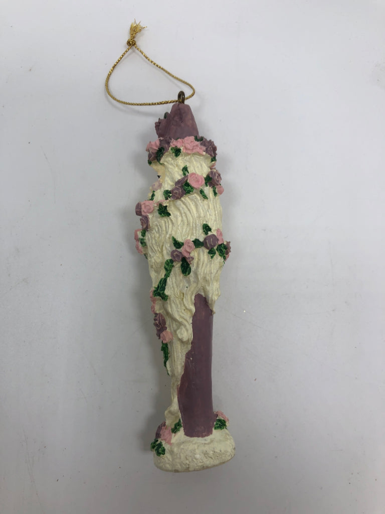 PURPLE FLORAL SANTA ORNAMENT.