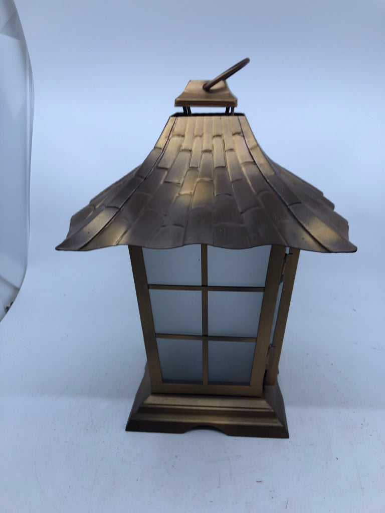 BRONZE METAL LANTERN WITH EMBOSSED FLOWER DESIGN ON GLASS AND FROSTED GLASS PANE