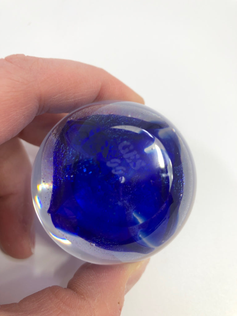 GES ROUND GLASS PAPERWEIGHT W/BLUE IRIDESCENT SHIMMER.