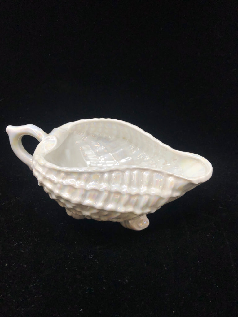 PEARLESCENT FOOTED SEASHELL DISH W/HANDLE.