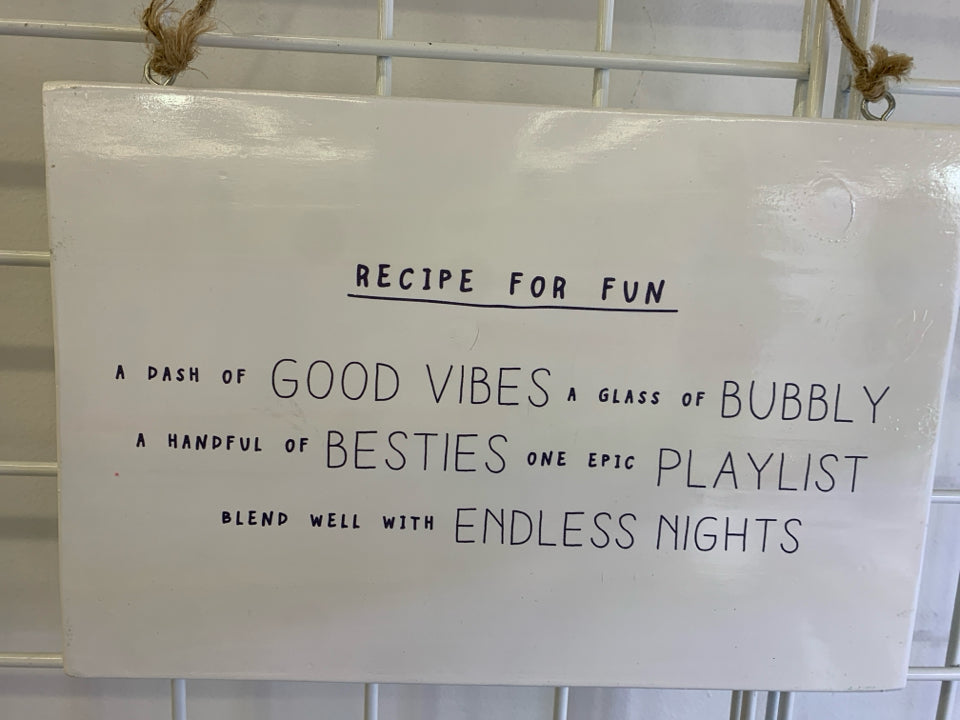 RISE AND GRIND SIGN.
