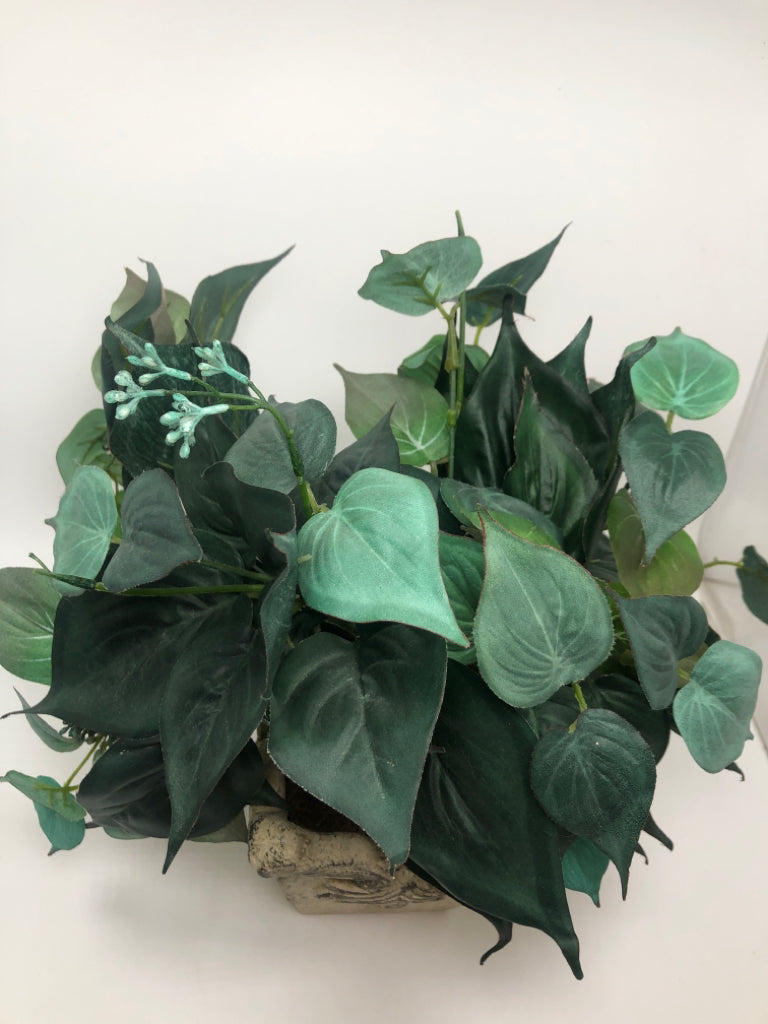 GREENERY IN FAUX STONE POT.