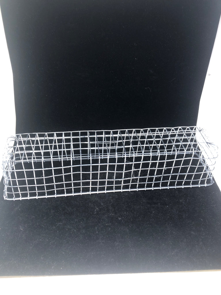 LONG WHITE METAL BASKET.