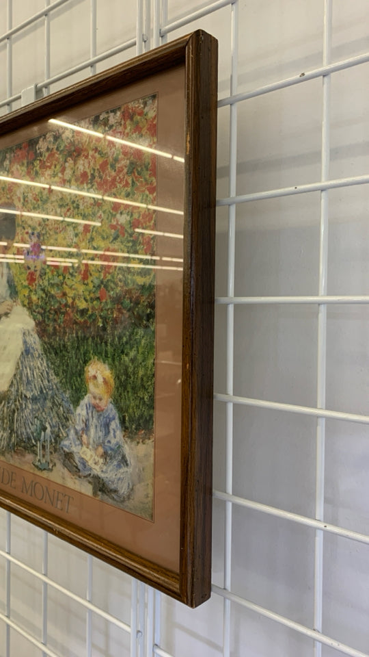 CLAUDE MONET WOMAN AND CHILD PRINT IN BROWN FRAME.