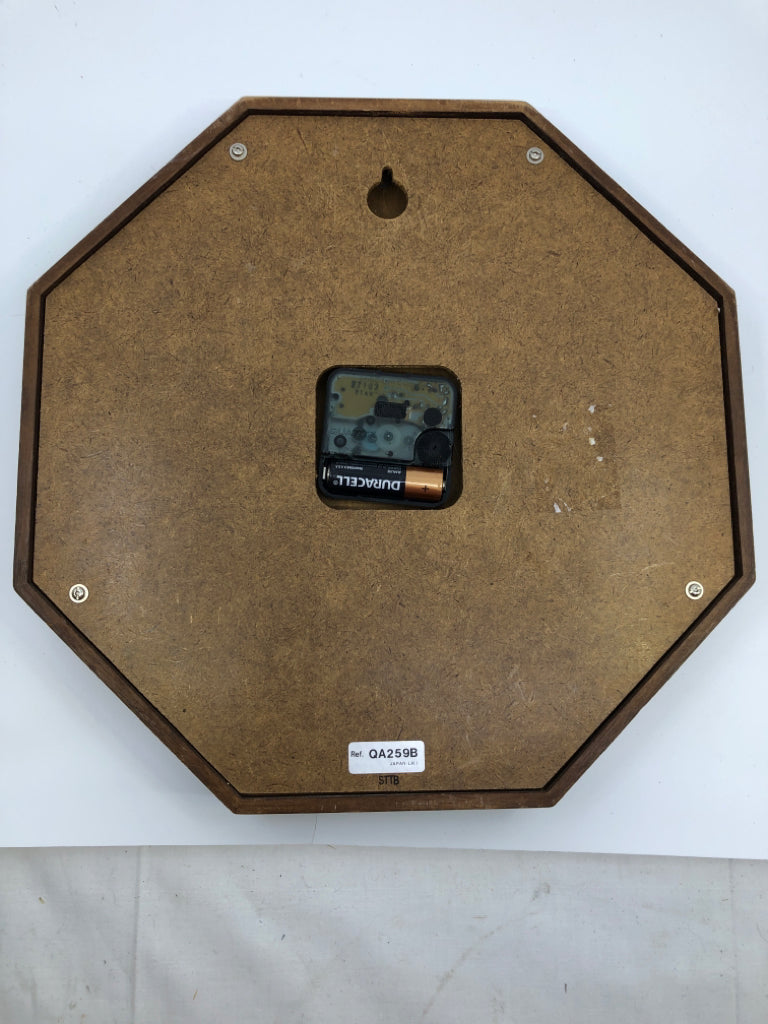 DARK WOOD SEIKO OCTAGON CLOCK.