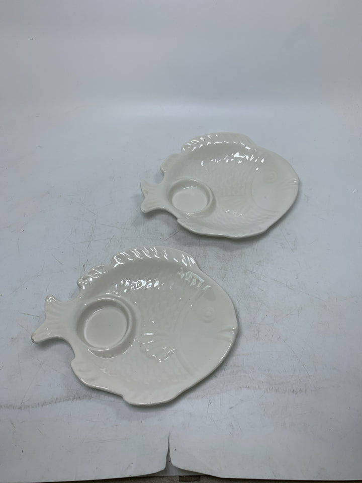 2 POTTERY FISH SHAPED TEXTURED TEA LIGHT HOLDERS.