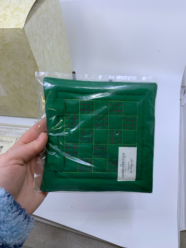 WOMAN MAKING PIES + QUILT.