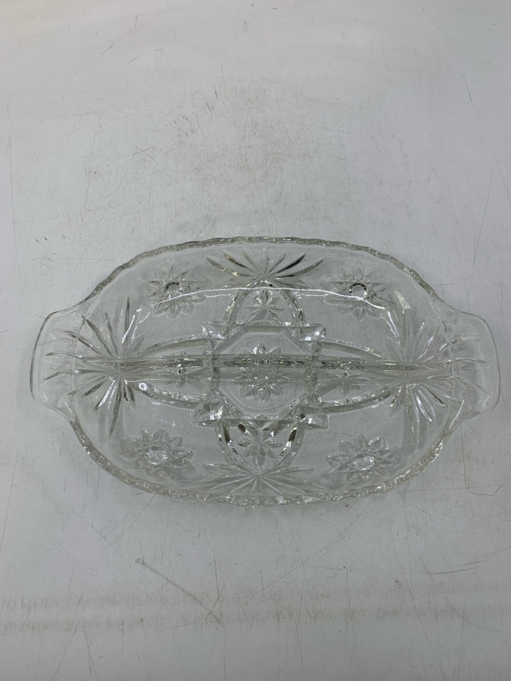 CLEAR GLASS DIVIDED OVAL SERVING DISH W/ STAR DETAIL HANDLES.