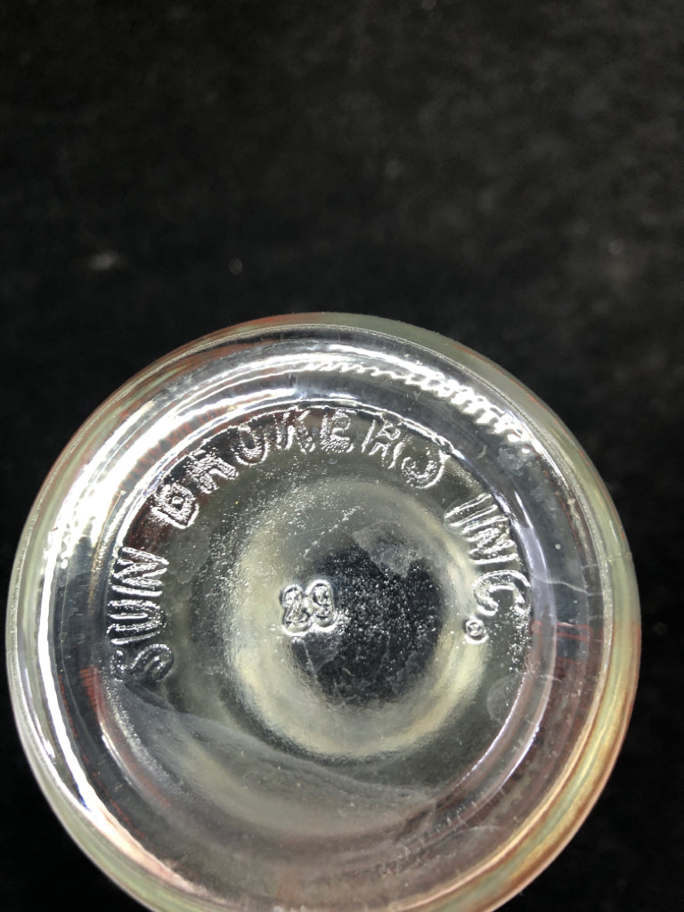 3PC DAIRY GLASS BOTTLES IN METAL HOLDER.