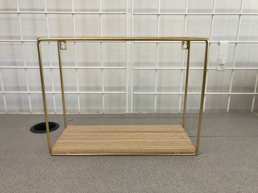 2 GOLD SHELVES W/TAN WOOD BASE.