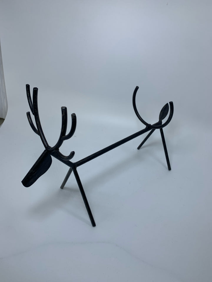 METAL STANDING STICK FIGURE REINDEER WINE BOTTLE HOLDER.