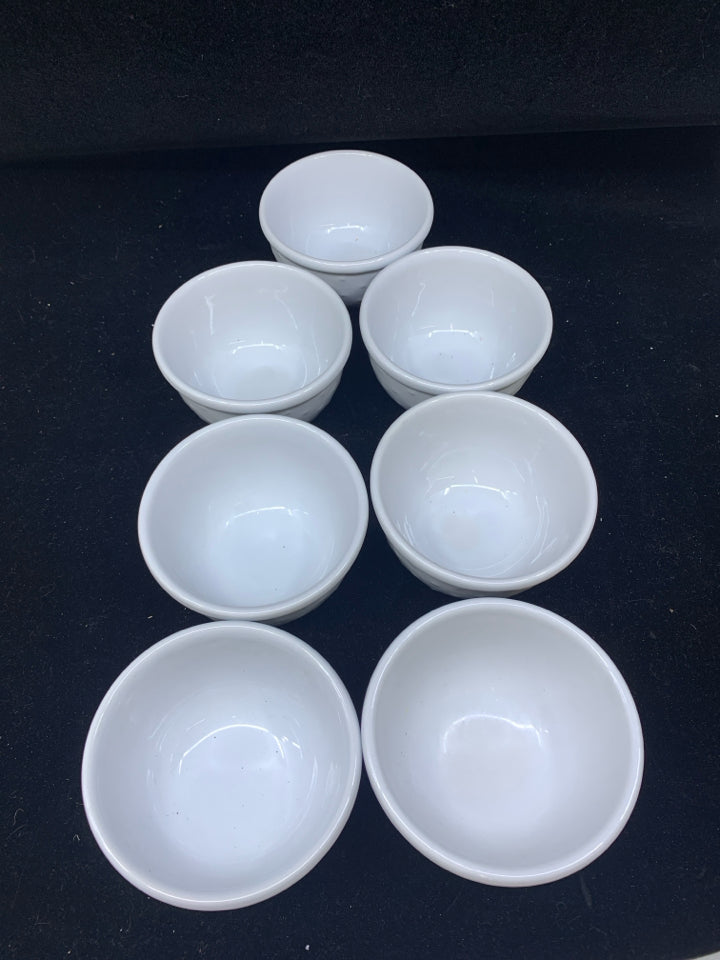 7 SMALL WHITE BOWLS.