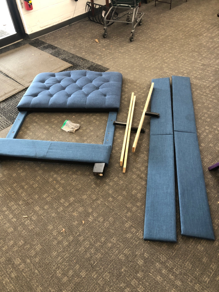 NAVY TWIN UPHOLSTERED FABRIC BED.