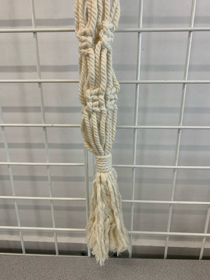 PATTERNED BEAD MACRAME PLANT HOLDER.